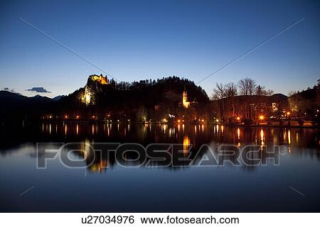 Stock Photograph - Lake Bled and Castle at Night. Fotosearch
