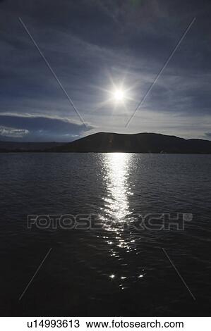 Lake Titicaca at dusk, Peru, Latin America View Large Photo Image Stock Image - Lake Titicaca at dusk, Peru, Latin America. Fotosearch