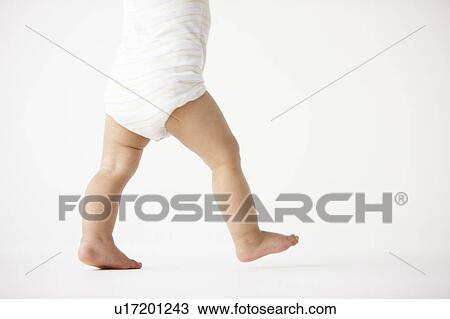 Low Section of Baby Boy Walking View Large Photo Image Stock Image - Low Section of Baby Boy Walking. Fotosearch