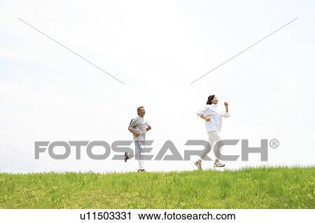 Mature couple jogging View Large Photo Image Stock Image - Mature couple jogging. Fotosearch