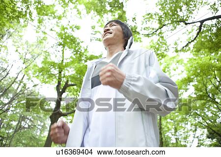 Picture - Mature man jogging. Fotosearch