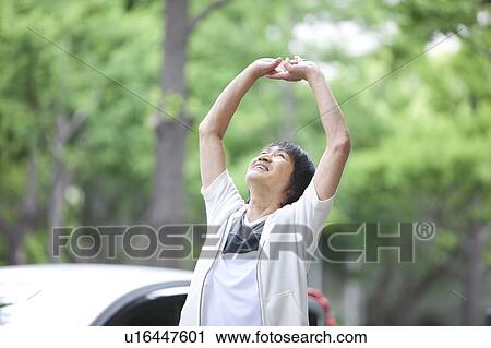 Stock Image - Mature man stretching. Fotosearch