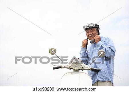 Mature man wearing a helmet View Large Photo Image Stock Photo - Mature man wearing a helmet. Fotosearch