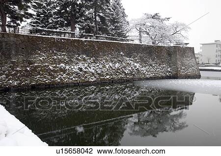 Stock Image - Moat in Tsuruga Castle in Winter. Fotosearch