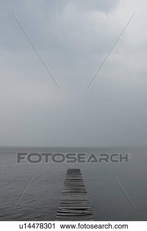 Stock Image - Old pier at a lake, Shiga Prefecture, Japan. Fotosearch