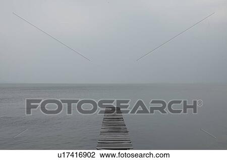 Stock Image - Old pier at a lake, Shiga Prefecture, Japan. Fotosearch
