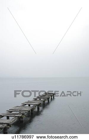 Stock Photo - Old pier at a lake, Shiga Prefecture, Japan. Fotosearch