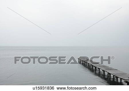 Stock Photograph - Old pier at a lake, Shiga Prefecture, Japan. Fotosearch