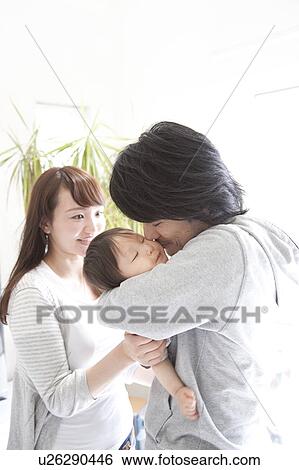 Parents Looking After Sleeping Baby View Large Photo Image Stock Photograph - Parents Looking After Sleeping Baby. Fotosearch