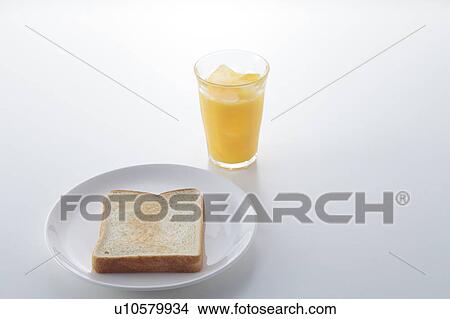 Piece of Toast and Orange Juice View Large Photo Image Picture - Piece of Toast and Orange Juice. Fotosearch