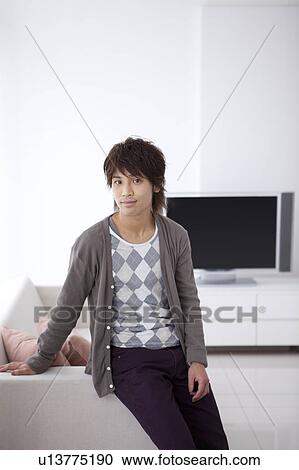 Stock Image - Portrait of a young man . Fotosearch