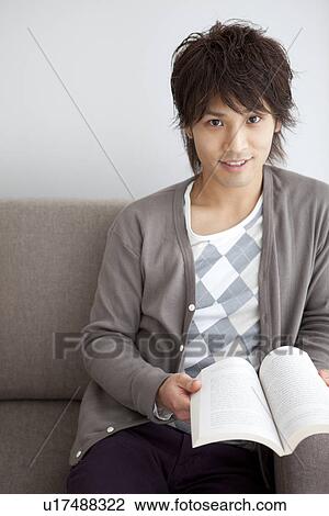 Portrait of a young man View Large Photo Image Stock Image - Portrait of a young man . Fotosearch
