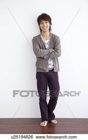 Portrait of a young man View Large Photo Image Stock Photograph - Portrait of a young man . Fotosearch
