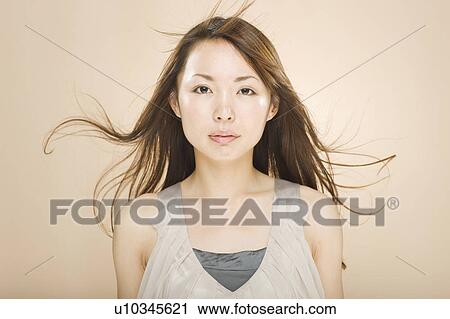 Portrait of a young woman View Large Photo Image Stock Image - Portrait of a young woman . Fotosearch
