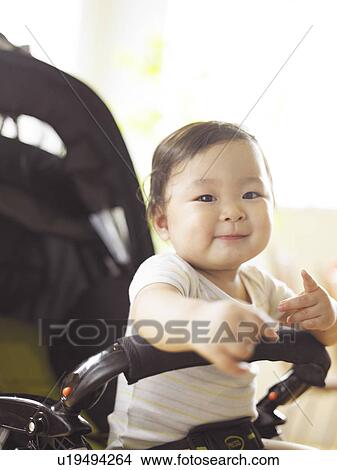 Portrait of Baby in Buggy View Large Photo Image Picture - Portrait of Baby in Buggy. Fotosearch