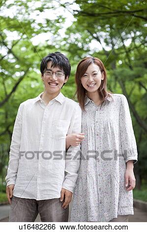 Portrait of young couple View Large Photo Image Stock Photograph - Portrait of young couple. Fotosearch
