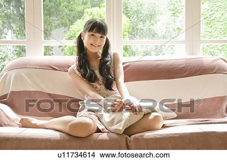 Portrait of Young Woman on Sofa View Large Photo Image Picture - Portrait of Young Woman on Sofa. Fotosearch