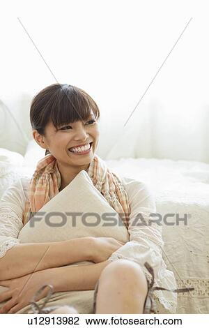 Stock Image - Portrait of Young Woman. Fotosearch