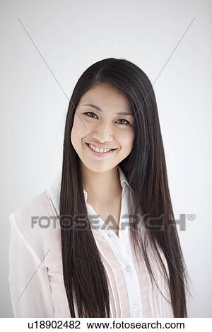 Stock Image - Portrait of young woman. Fotosearch