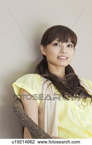 Stock Image - Portrait of Young Woman. Fotosearch