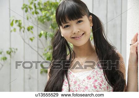 Portrait of Young Woman View Large Photo Image Stock Photo - Portrait of Young Woman. Fotosearch