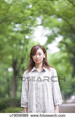Stock Photo - Portrait of young woman. Fotosearch