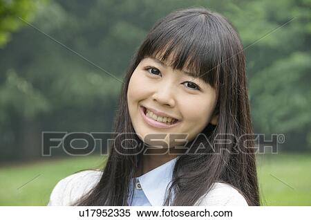 Stock Photography - Portrait of Young Woman. Fotosearch