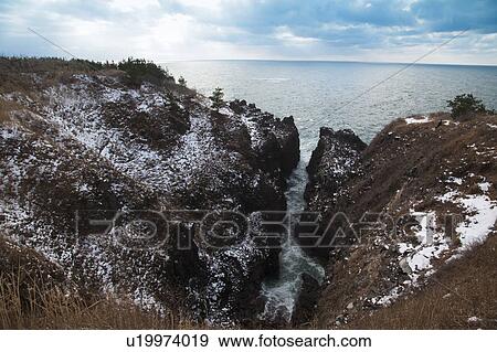 Rocky Coastline in Winter View Large Photo Image Stock Photo - Rocky Coastline in Winter. Fotosearch