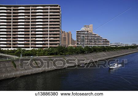 Sakaigawa river and apartments, Urayasu City, Chiba Prefecture, Honshu, Japan View Large Photo Image Stock Image - Sakaigawa river and apartments, Urayasu City, Chiba Prefecture, Honshu, Japan. Fotosearch