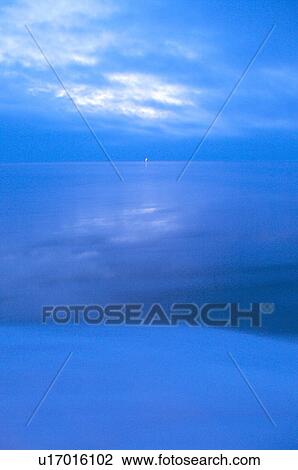 Stock Image - Sea at dawn, Hokkaido Prefecture, Japan. Fotosearch