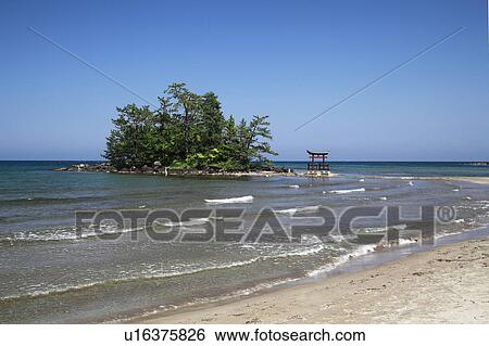 Stock Photograph - Shinto Gate at Seashore. Fotosearch