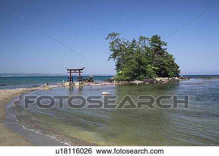 Stock Photograph - Shinto Gate at Seashore. Fotosearch