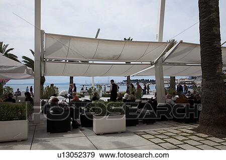 Stock Photo - Sidewalk Cafe. Fotosearch