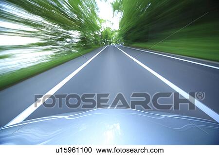 Speeding car View Large Photo Image Stock Image - Speeding car. Fotosearch