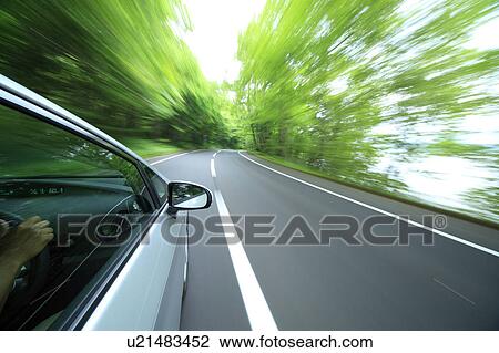 Speeding car View Large Photo Image Stock Image - Speeding car. Fotosearch