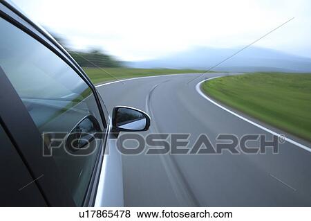 Speeding car View Large Photo Image Stock Photo - Speeding car. Fotosearch