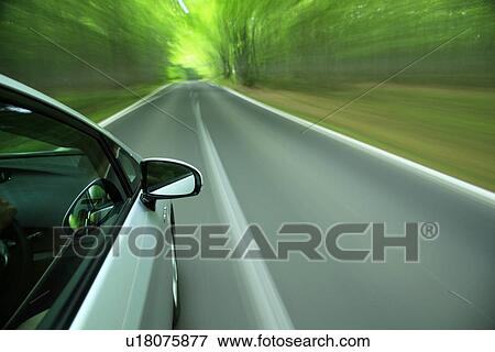 Speeding car View Large Photo Image Stock Photo - Speeding car. Fotosearch