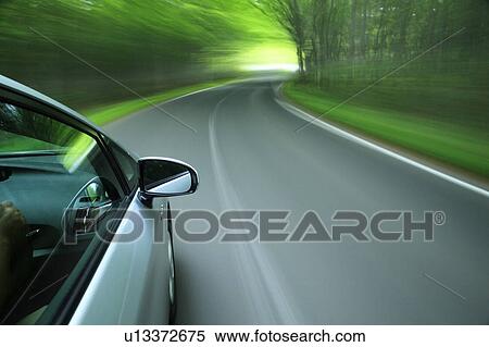Speeding car View Large Photo Image Stock Photography - Speeding car. Fotosearch
