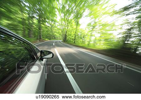 Speeding car View Large Photo Image Stock Photography - Speeding car. Fotosearch