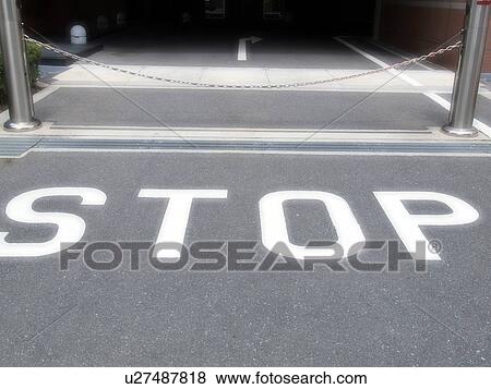 Stock Photo - Stop Sign on Road. Fotosearch