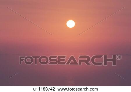 Stock Image - Sunrise, Hokkaido Prefecture, Japan. Fotosearch