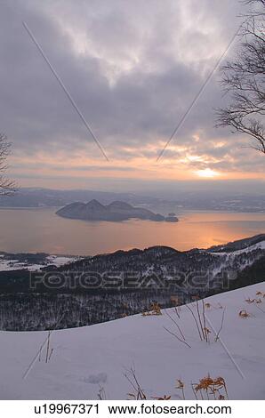 Sunrise over Lake Toya in Winter View Large Photo Image Stock Image - Sunrise over Lake Toya in Winter. Fotosearch