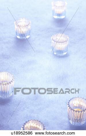 Tea Lights on Snow View Large Photo Image Stock Photograph - Tea Lights on Snow. Fotosearch
