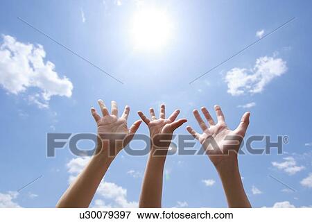 Three Hands Against Sky View Large Photo Image Stock Photo - Three Hands Against Sky. Fotosearch