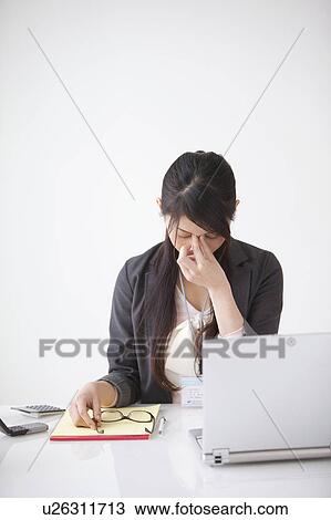 Tired businesswoman View Large Photo Image Stock Image - Tired businesswoman. Fotosearch