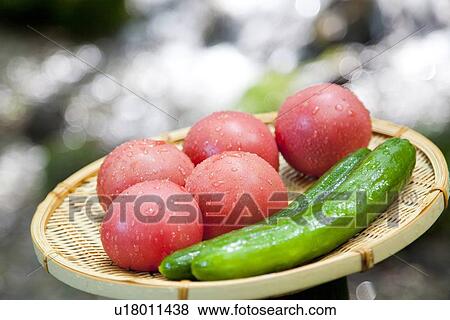 Stock Photo - Tomatoes and Cucumbers. Fotosearch
