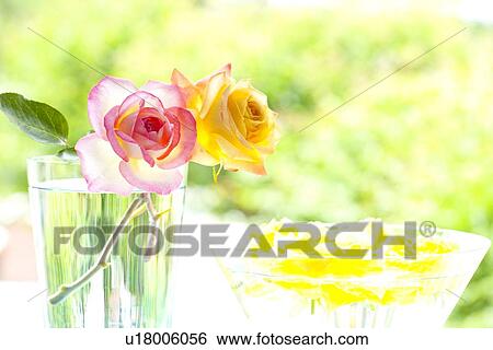 Stock Photograph - Two Roses in Vase. Fotosearch