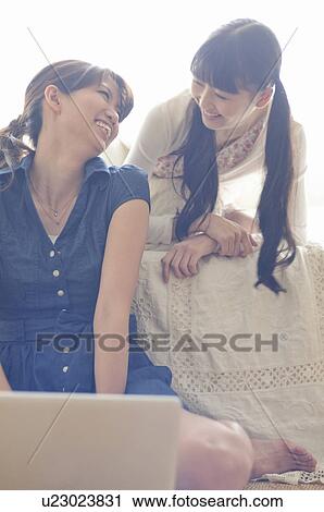 Two Young Female Friends View Large Photo Image Stock Image - Two Young Female Friends. Fotosearch