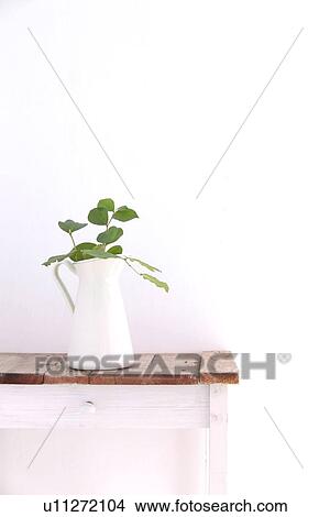 Vase on side table View Large Photo Image Picture - Vase on side table. Fotosearch