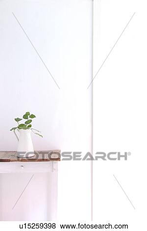 Vase on side table View Large Photo Image Stock Photo - Vase on side table. Fotosearch